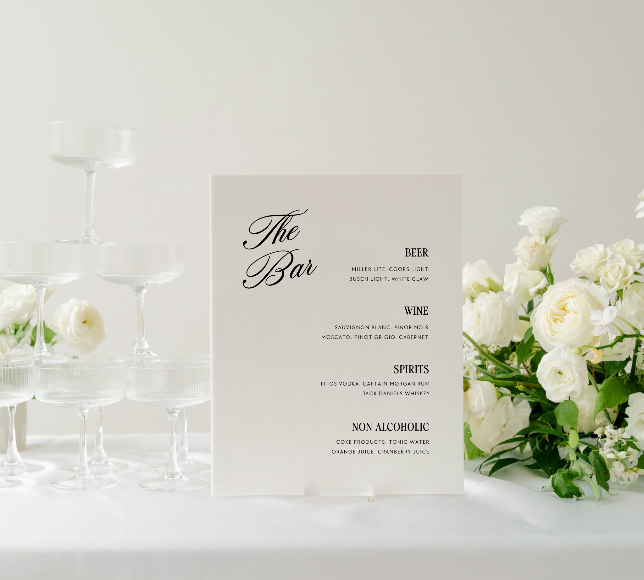 Acrylic wedding bar menu sign listing beer, wine, spirits and non-alcoholic drinks