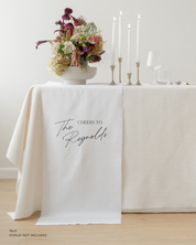 Quinn linen wedding sweetheart table sign reading Cheers to The Reynolds